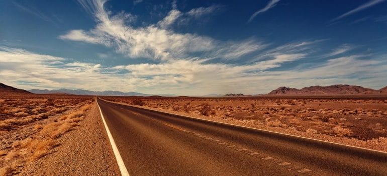 A deserted road in Nevada is a path local movers Las Vegas often cross