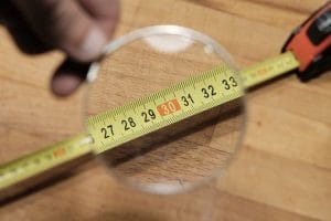 Use a magnifying glass with your measuring tape if you need to.