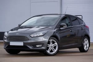 A grey Ford car. Driving a car is one of your options for getting around Las Vegas.