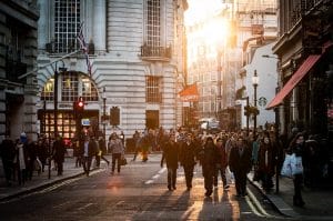 people walking on the street - find the best neighborhood