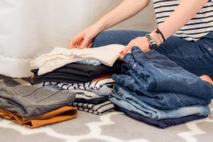 A woman packing clothes