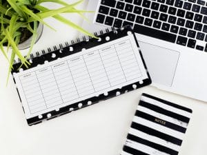 planner,notepad and laptop keyboard