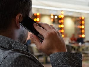 a man talking on the phone 