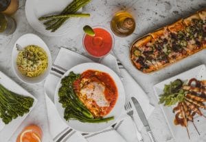 A table with elaborate meals on it