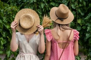 handle the summer heat when moving by wearing hats