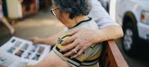 Older couple reading newspapers