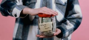 man holding jar