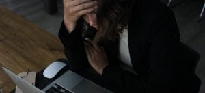 a woman comparing moving quotes on her lap top