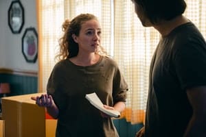 Two people considering the moving cost