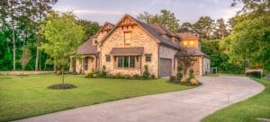 a view of a house next to a pathway during daytime