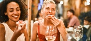 Two girls eat and Drink on a Day Trip to Boulder City 